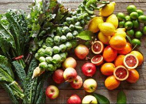 a group of fruits and vegetables on a wood surface Healthy Weight Loss Diets Spring Bank